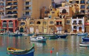 Buildings and boats surrounding a bay in Malta
