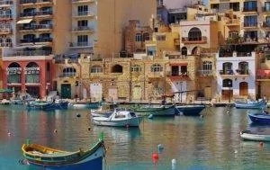 Buildings and boats surrounding a bay in Malta