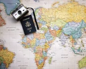 Map with camera and passport.