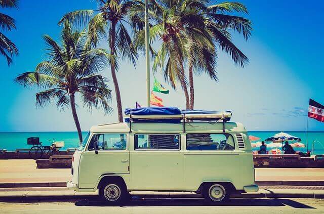 Trip Planning Resources: Van in front of beach.