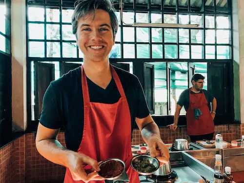 Chris showing his curry paste at Thai Farm Cooking School