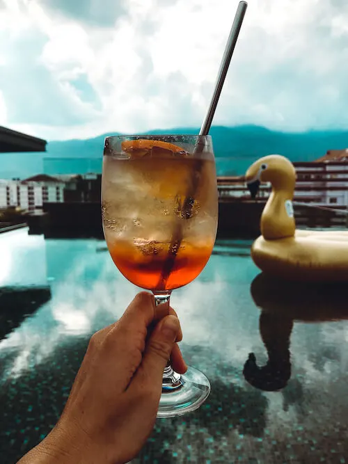 Akyra Manor rooftop pool with Aperol Spritz