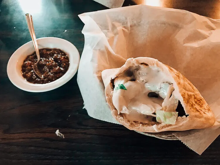 Falafel sandwich with hummus and hot sauce from Old Jerusalem