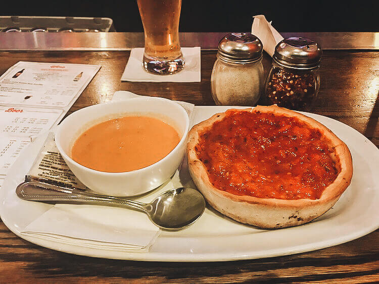 Giordano's pizza with tomato soup