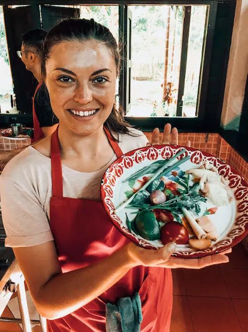 Kat with ingredients for cooking