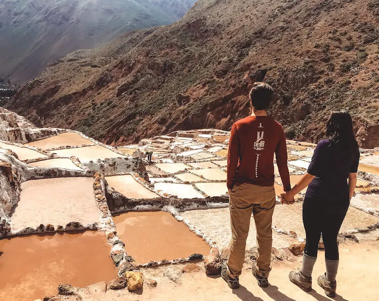 Kat and Chris overlooking the Maras Salt Mine in Peru - 10-day Peru itinerary