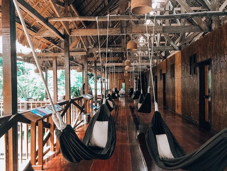 Hammocks in the common area of the Tambopata Research Center