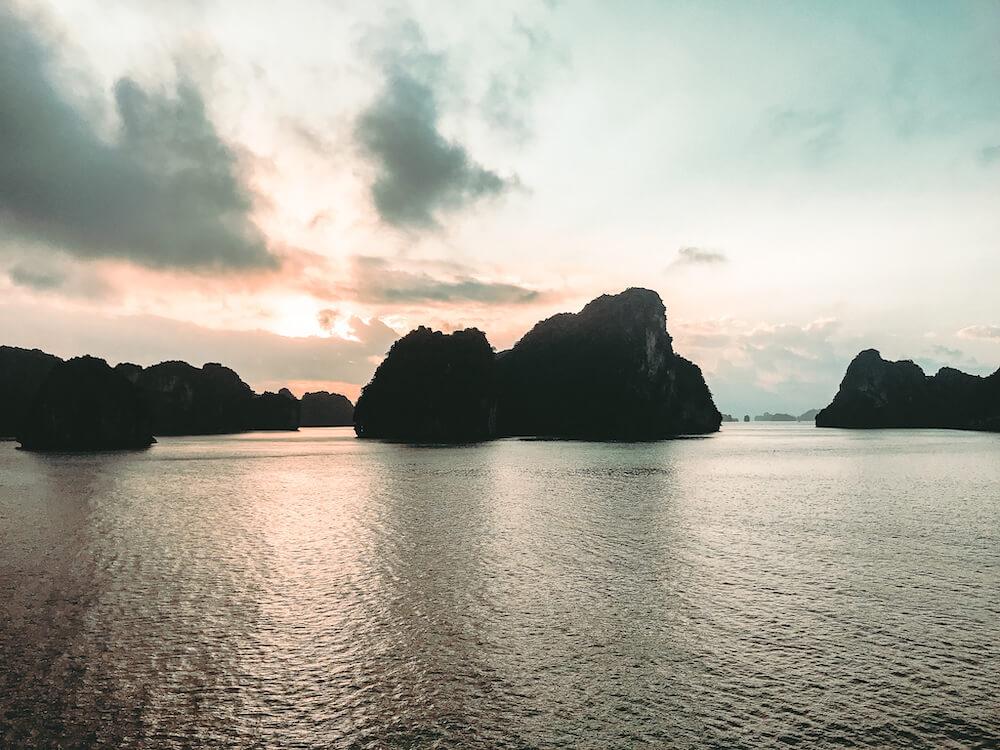 Bai Tu Long Bay Cruise at sunset: Best Halong Bay Itinerary