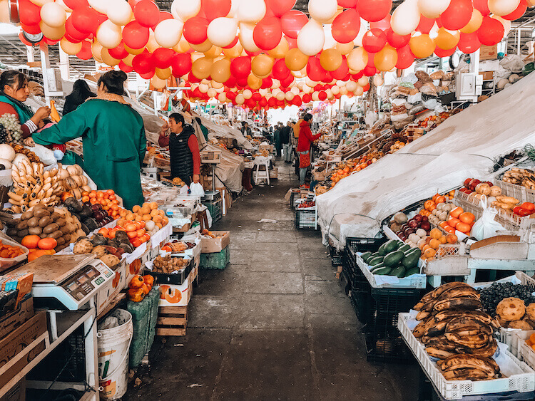 San Pedro Market fruit and veggie stands in Cusco - Peru itinerary