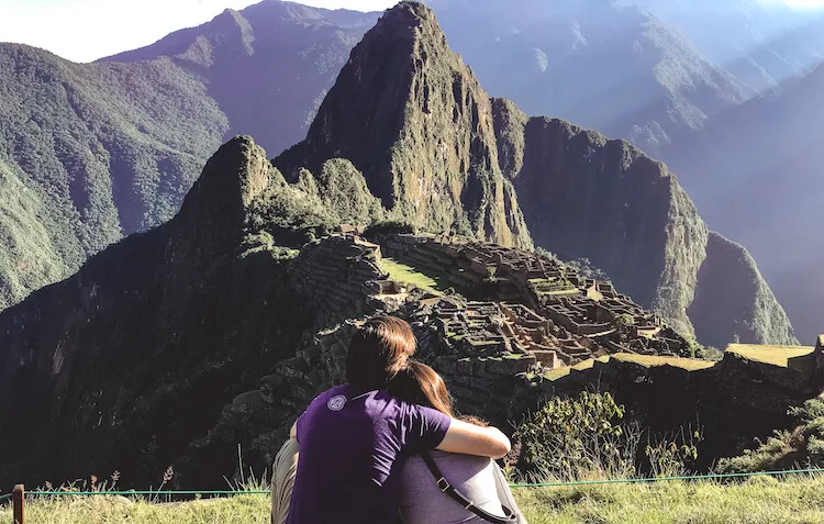 Kat and Chris Cuddling in front of Machu Picchu
