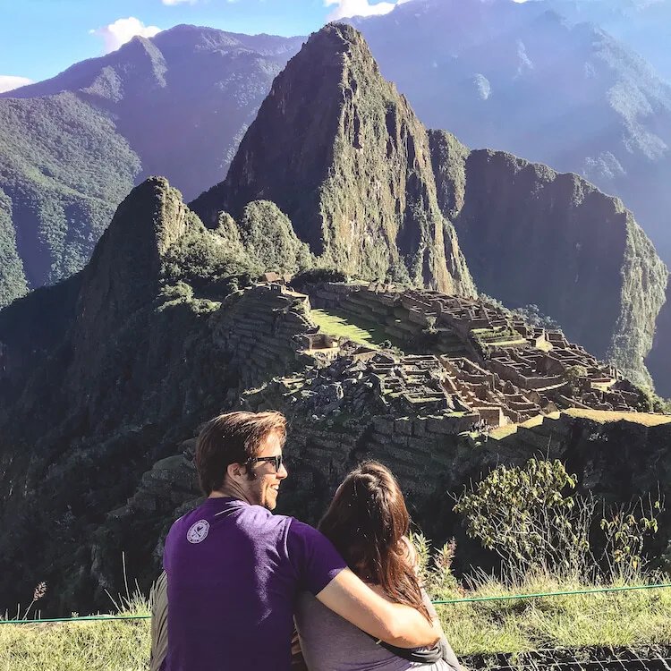 Kat and Chris laughing next to Machu Picchu