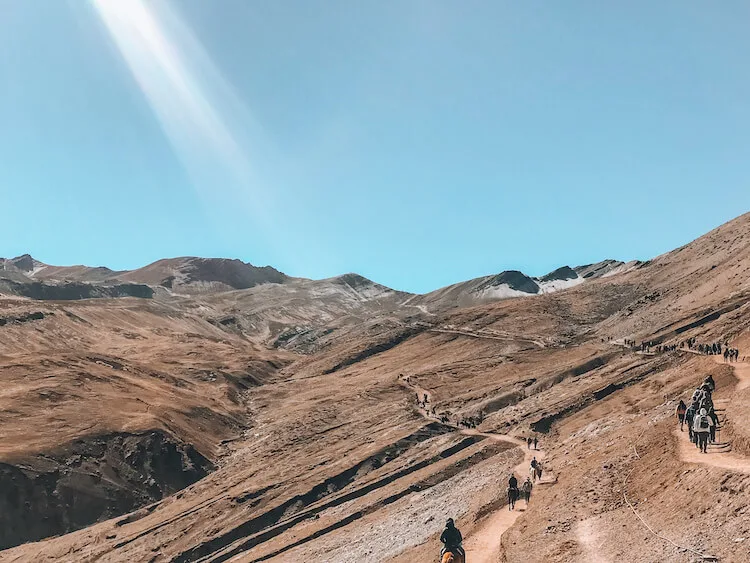 Hiking down from Rainbow Mountain and seeing all the crowds going