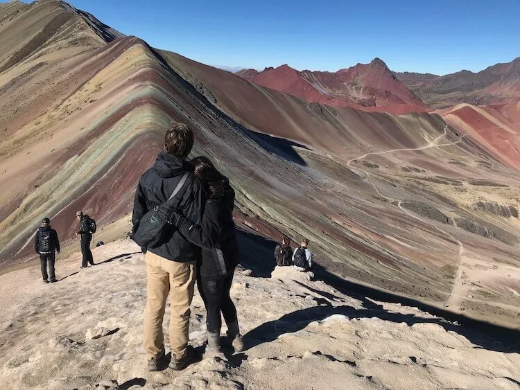 Kat and Chris looking at Rainbow Mountain