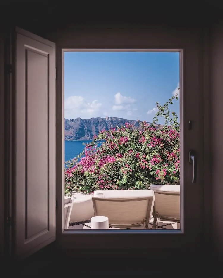 View of the Caldera from window in Santorini, Greece