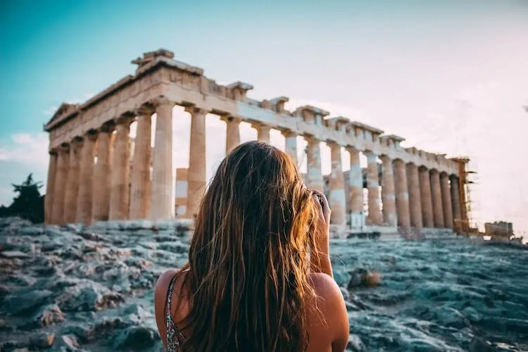 woman in front of the Acropolis