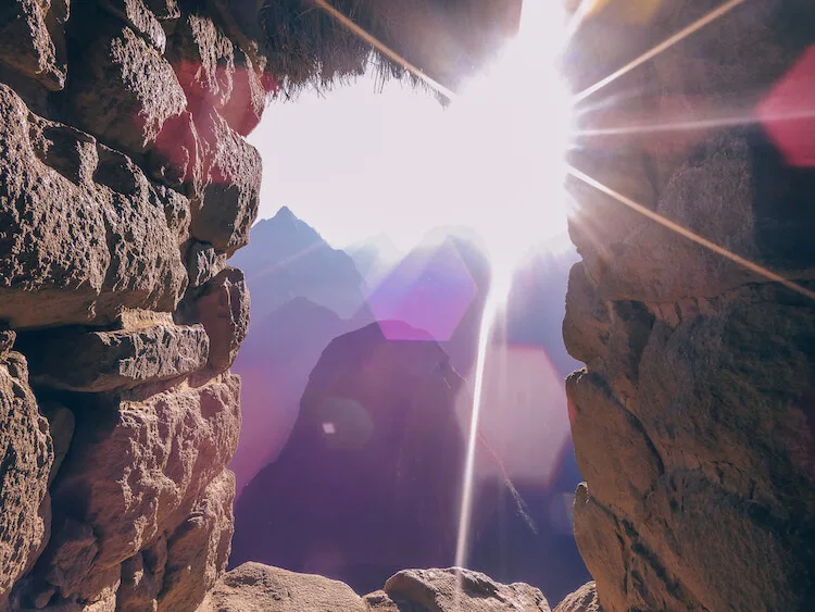 Peeking out a window at Machu Picchu