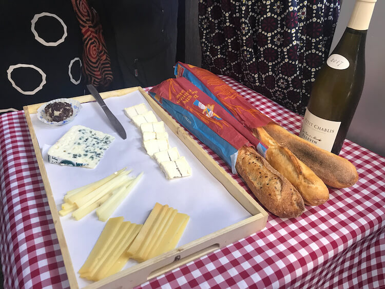 Cheese, Wine, and Baguette at Marche des Enfants Rouges in the Le Marais neighborhood - Best arrondissement to stay in Paris