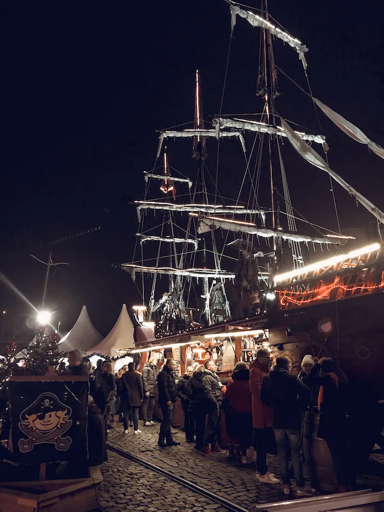 Gluhwein stand ship at the Harbor Christmas Market in Cologne Germany