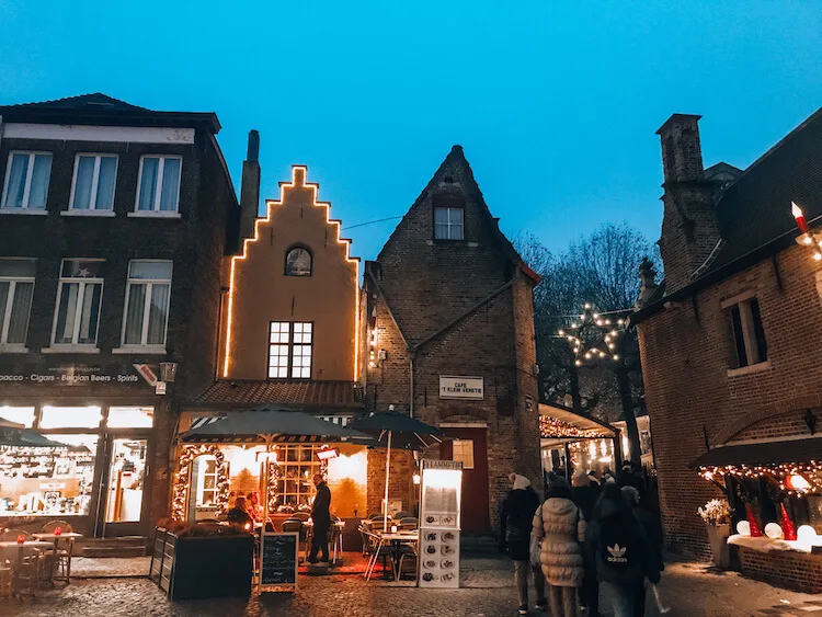 Old buildings and street cafes in Bruges-Bruges Day Trip