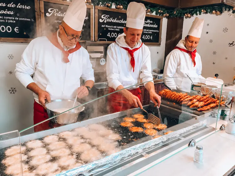 Potato pancakes being made at the Cologne Cathedral Christmas market