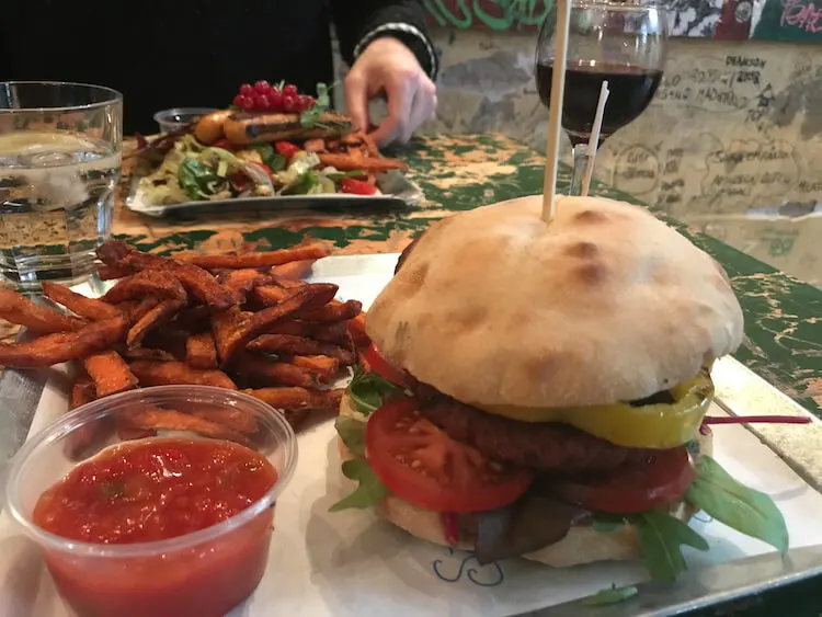 Vegan burger and sweet potato fries at Szimpla Kert in Budapest, Hungard - Top Restaurants in Budapest