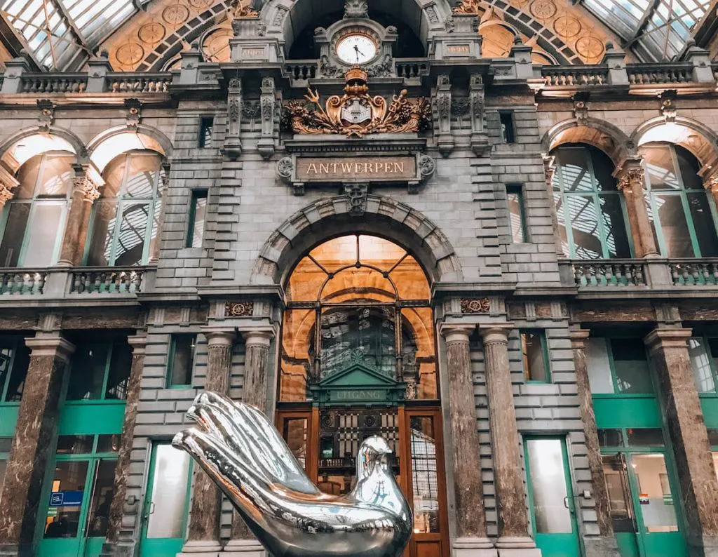 Antwerpen Central Train Station with hand sculpture