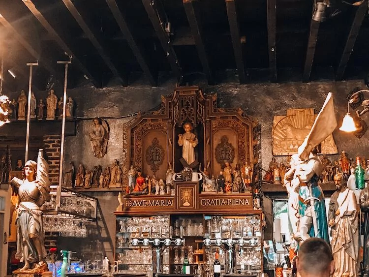 Bar area inside of Elfde Gebod with alter peices