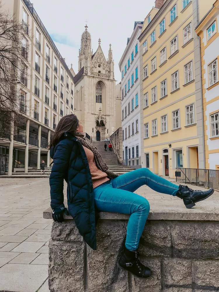 Kat reclining on a wall in Vienna