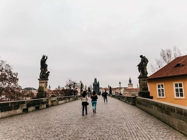 Charles Bridge in the morning with statues along it