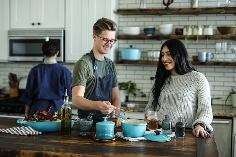 Couple cooking together at home