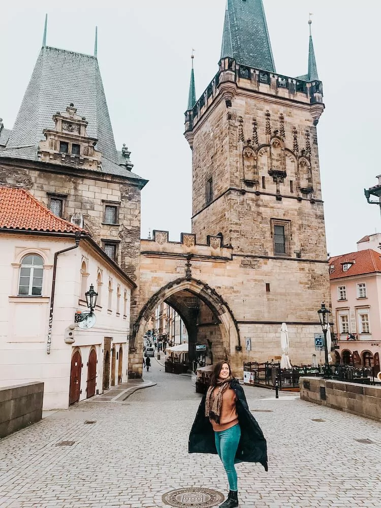 Kat in front of the Lesser Town Tower in Prague