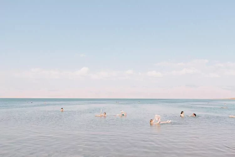 People floating in the Dead Sea- Bucket List Destinations For Couples Who Love Travel