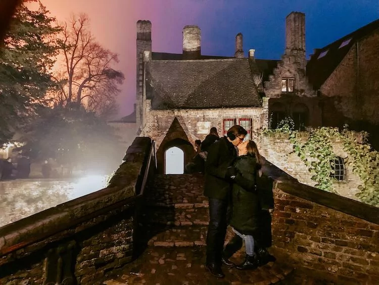 Kat and Chris on Lover's Bridge in Bruges