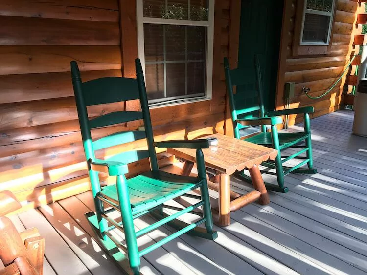 Back deck in our cabin with rocking chairs