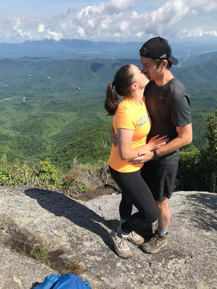 Kat and Chris kissing on the top of Mount Cammerer - 3 Day Smoky Mountains Itinerary