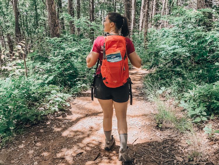 Kat with the Moon Travel Guide to the Smoky Mountains on a trail