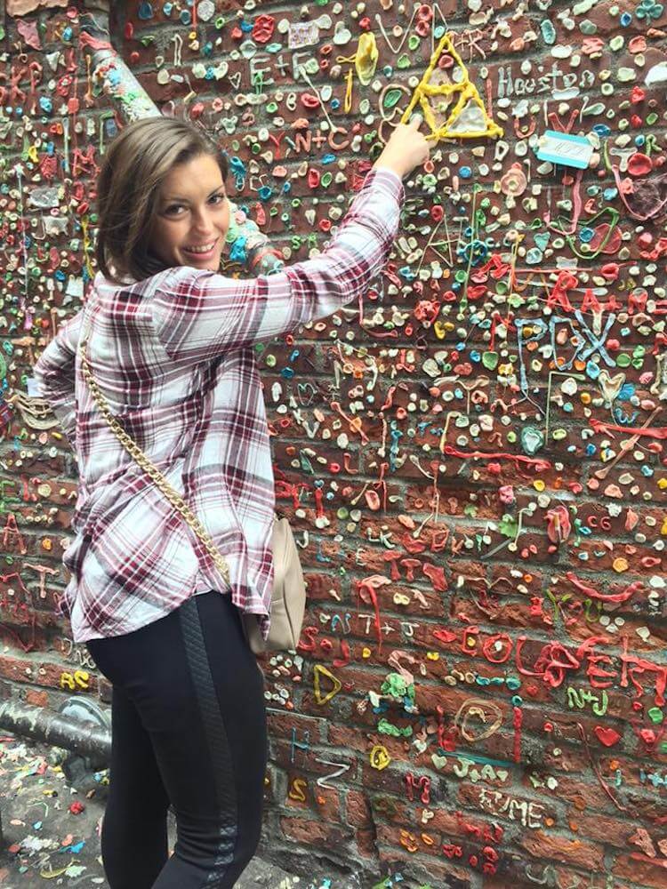 Kat at the Gum Wall in Seattle - Top Things to do during a 3 day Seattle Itinerary