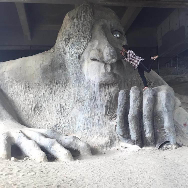 Kat kissing the Fremont Troll in Seattle - 3 Days in Seattle