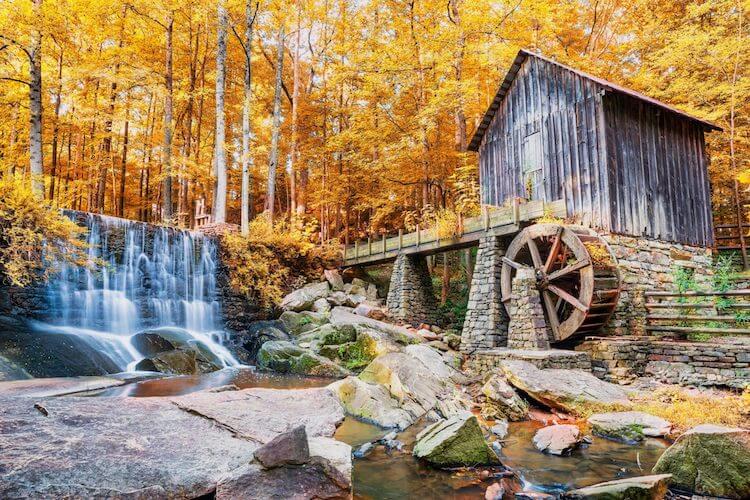 Fall-in-Georgia-Marietta-historic-mill-and-waterfall - Best Fall Vacations in the US