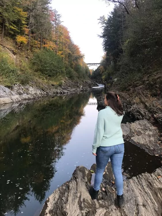 Kat-looking-out-over-Quechee-Gorge-Vermont-Fall-Road-Trip-Itinerary