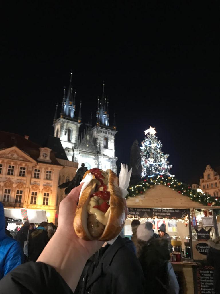 Herb sausage in front of the Prague Old Town Square Christmas Market