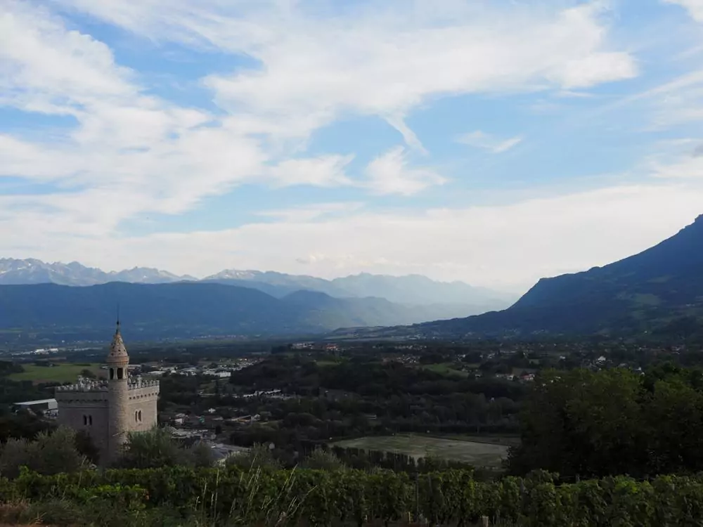 Castle with mountains in the background