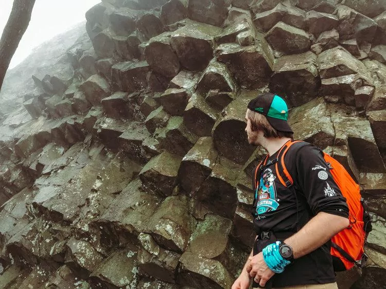 Basalt columns and Chris standing in front of them at Shenandoah National Park