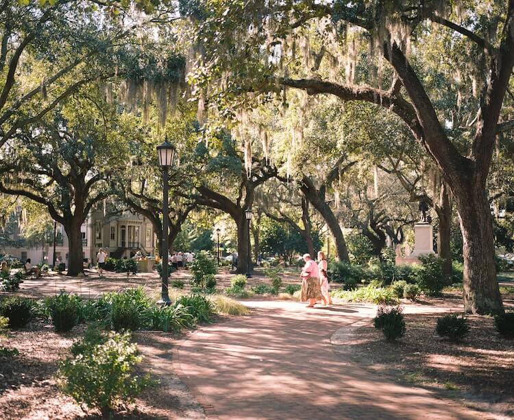 Women walking in a park in the middle of Savannah - Best Honeymoon Destinations in the USA