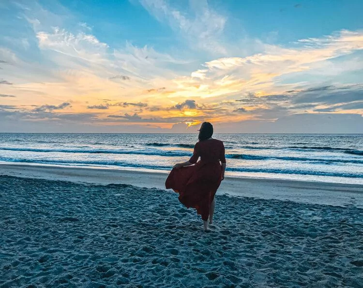 Kat watching the sunrise on Tybee Island