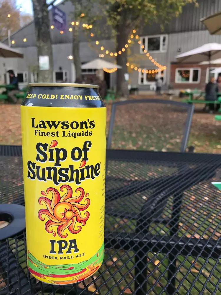 Lawson's Sip of Sunshine on an outdoor back table