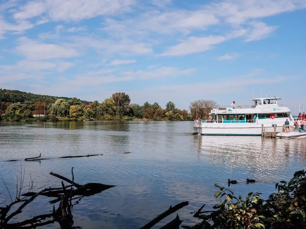 Boat cruising on the river near Ithaca