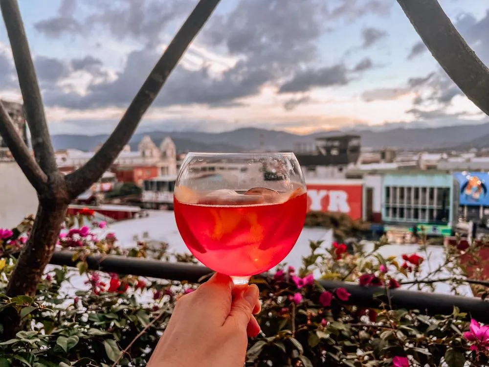 Aperol Spritz in the foreground with San Jose in the background