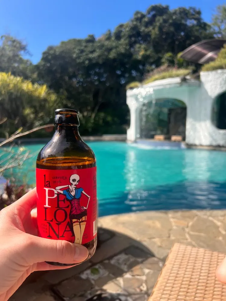 Beer by the pool at Finca Rosa Blanca