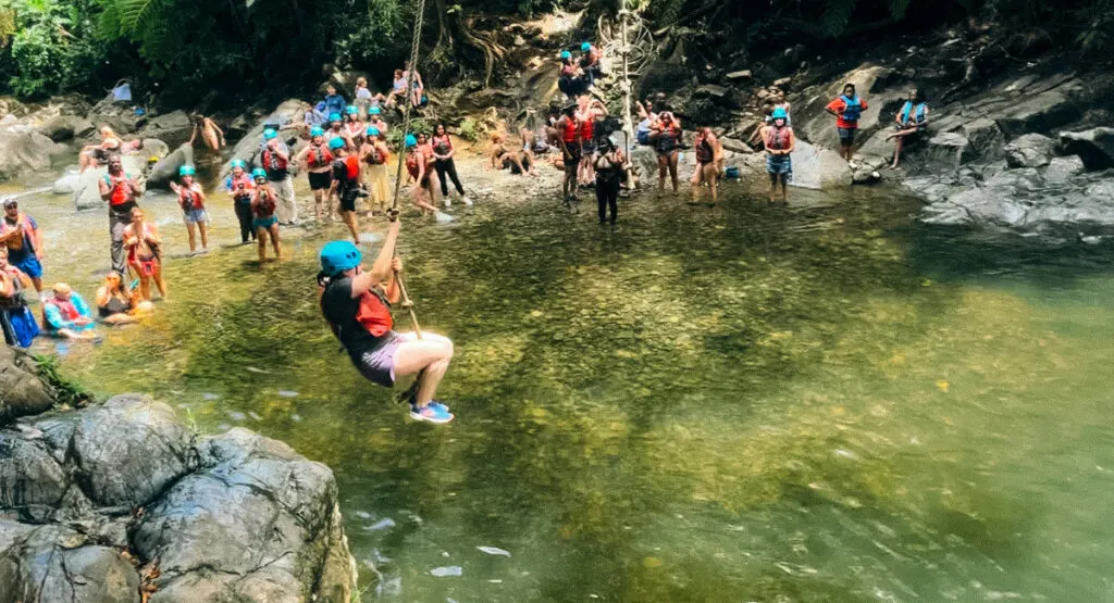 Kat on a rope swing in El Yunque